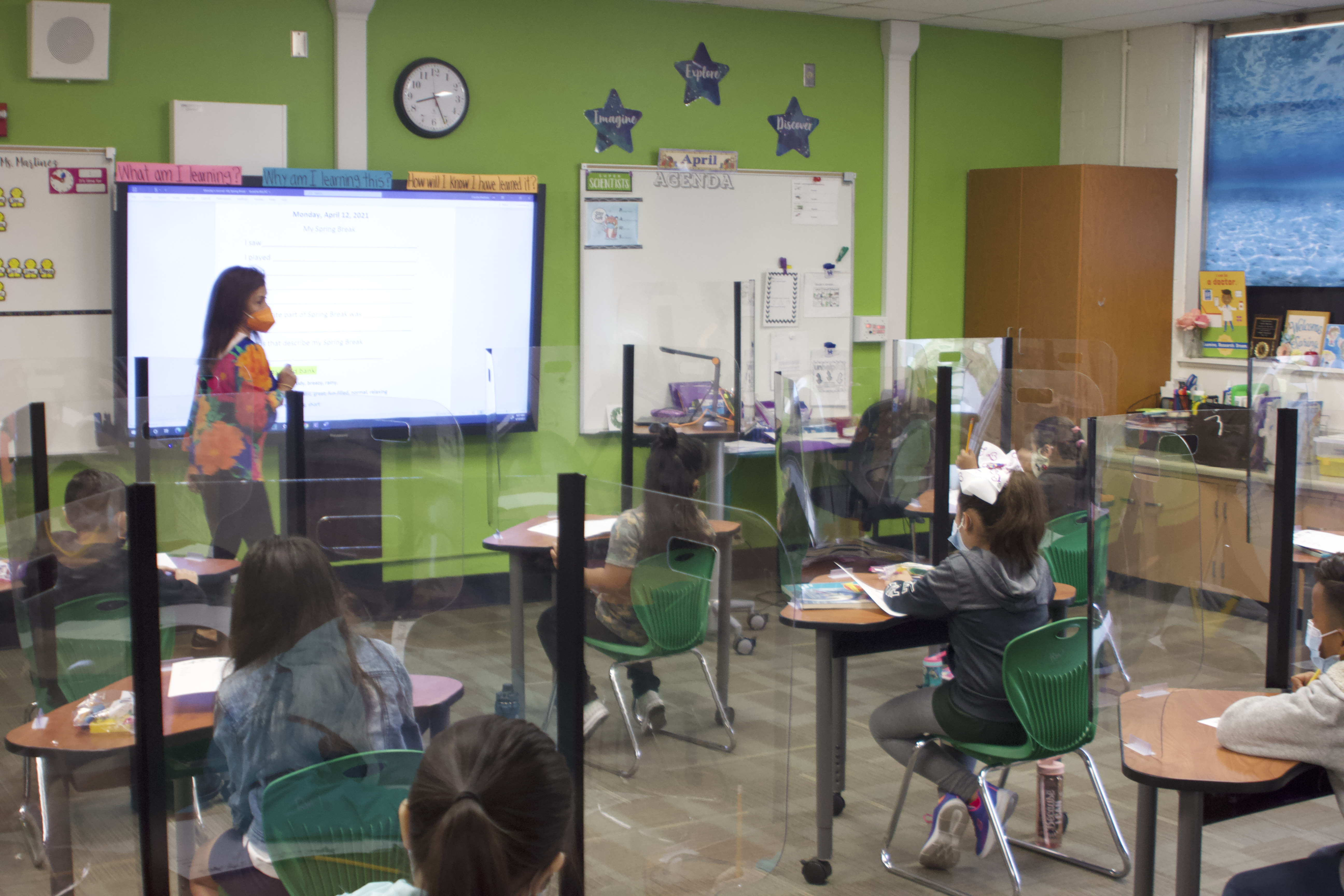 Ms. Martinez answers a student question at Sunkist Elementary on the first day back.